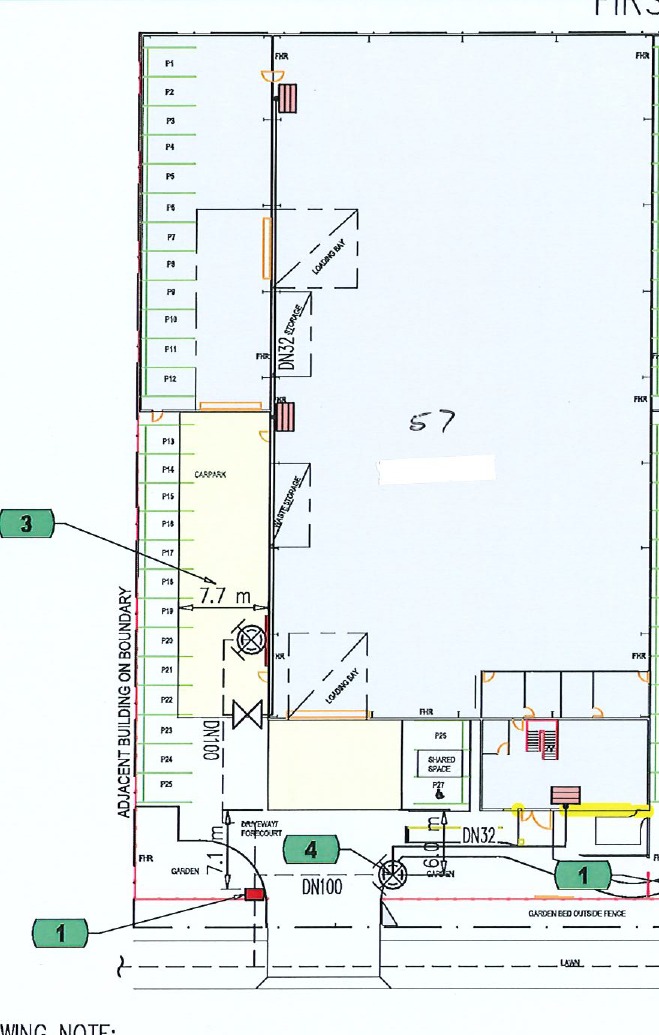 Complex commercial evacuation diagram with detailed room structure and emergency guidance.